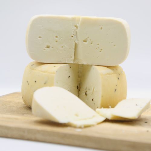 Tomme pur chèvre aromatisée 250 g – Fromage artisanal marocain Tomme pur chèvre aromatisée 250 g – Fromage artisanal marocain